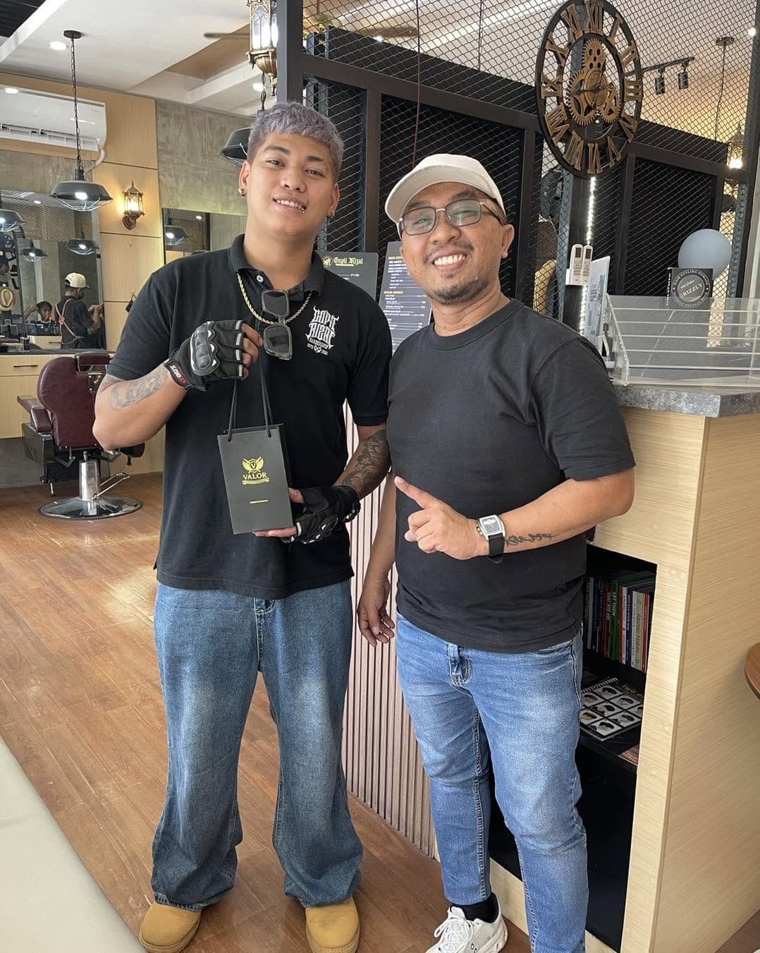 A Valor customer at a partner barbershop
