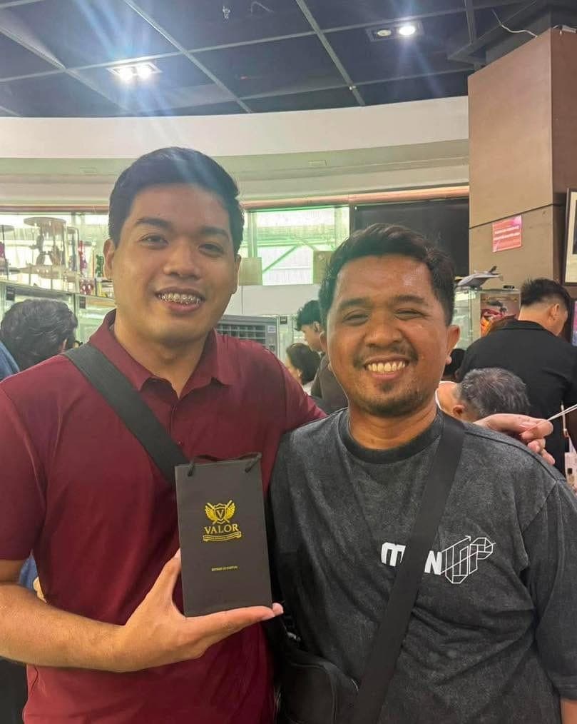 A customer with a Valor gift bag