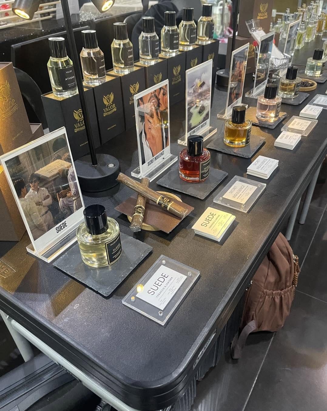 Valor Extrait bottles on display